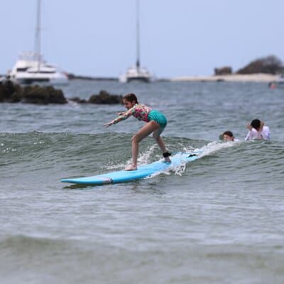 Surfing with Locals at Tamarindo Beach photo 2