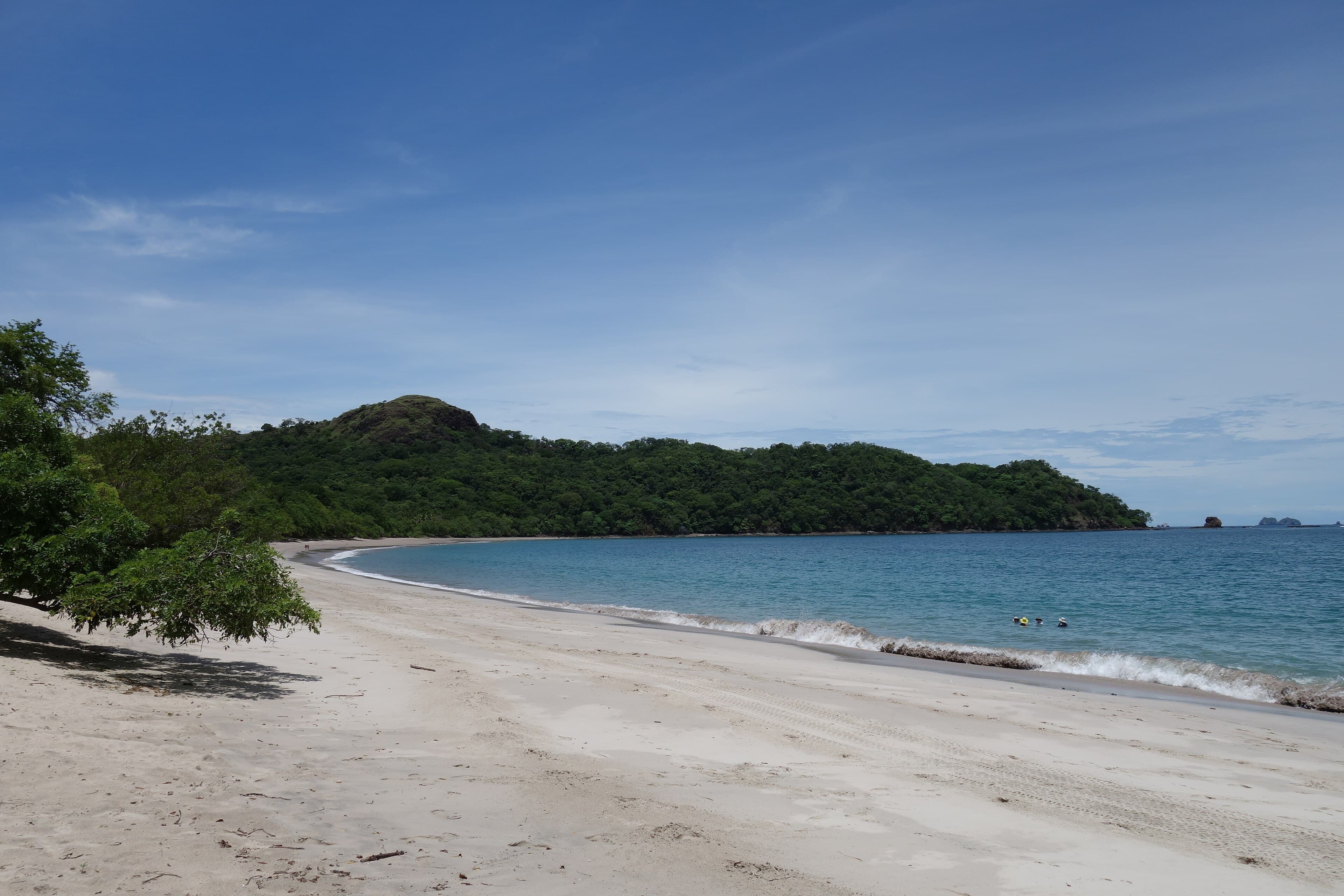White shell sand and clear water at the north end of Playa Conchal