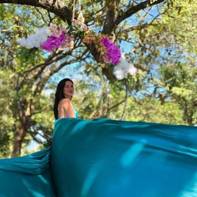 Sky Blue Bachelorette: A beautiful individual shot in a sky blue flying dress, perfect for a memorable bachelorette photoshoot.