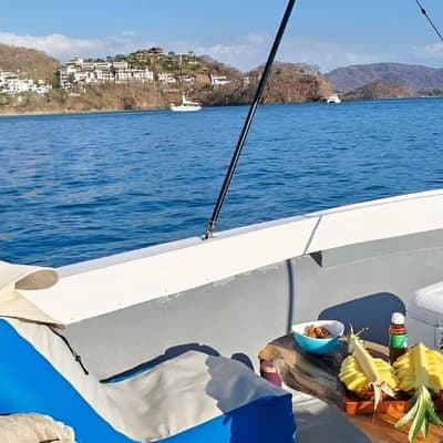Fishing and snorkeling in Playa Flamingo drink and snacks photo 4
